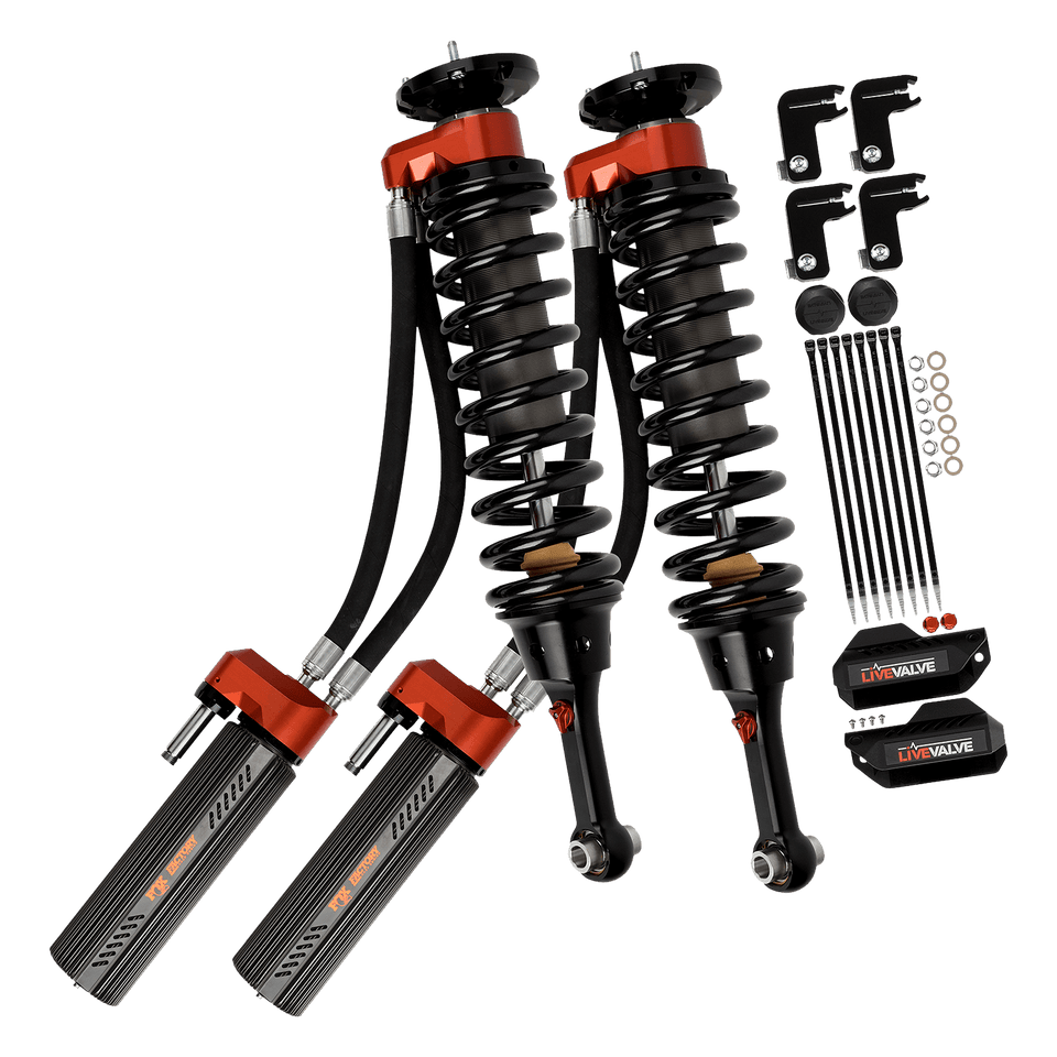 https://serenity-foxfactory.asset.akeneo.cloud/fox_asset_family/media/883_06_153_fox_truck_factory_race_live_valve_shocks_op_1600x1600.png